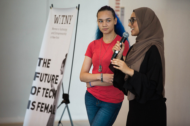 2 WiTNY students speaking to a crowd