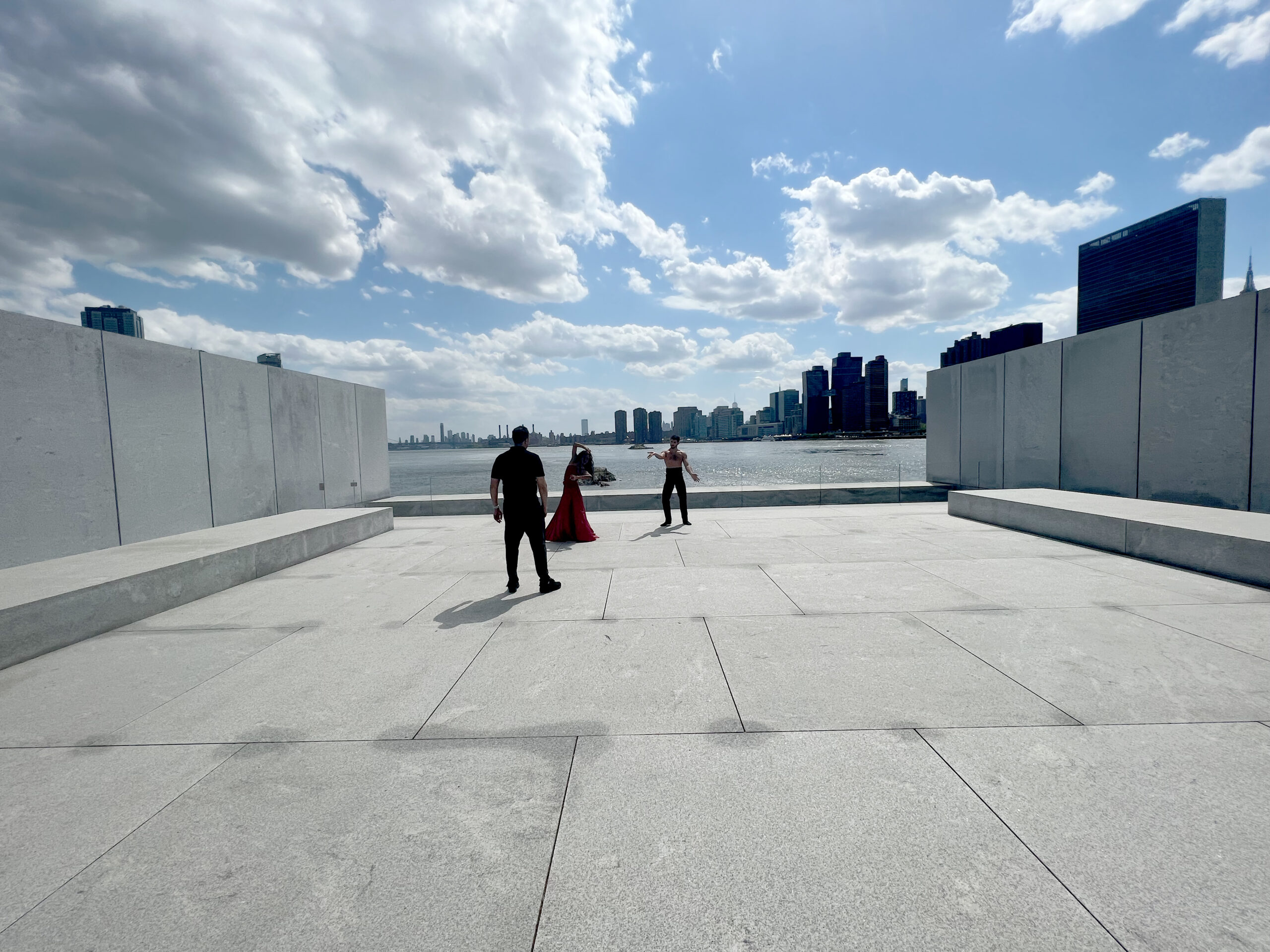 Ballet Hispánico’s Artistic Director and CEO Eduardo Vilaro choreographing company dancers Dandara Veiga and Mariano Zamora in Four Freedoms Park, Roosevelt Island.