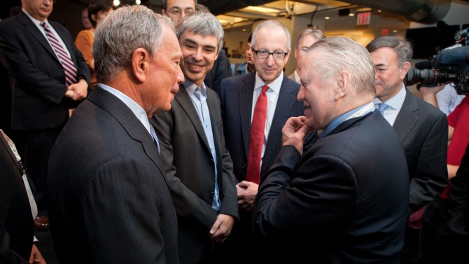 From left, then-New York City Mayor Michael Bloomberg, Google co-founder and CEO Larry Page, then-Cornell President David Skorton, Feeney and Robert Harrison ’76, then-chairman of the Cornell Board of Trustees, at a May 2012 press conference announcing that Cornell Tech would have its first physical space, free of charge, in a New York City building owned by Google.
